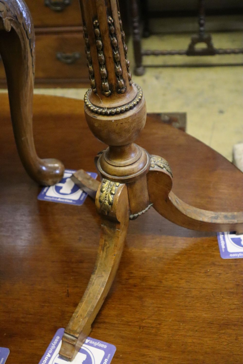 A brass mounted walnut tripod wine table and a Queen Anne style walnut low table, tripod table diameter 34cm height 75cm